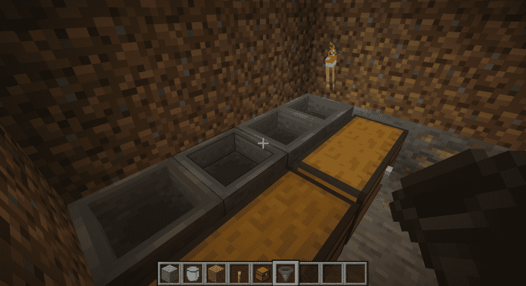 place four hoppers directly behind the chests