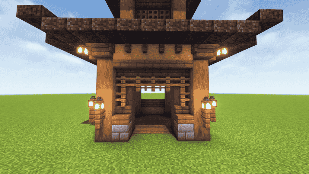 placing 2 spruce fence and 2 lanterns on each side of the lower pillars
