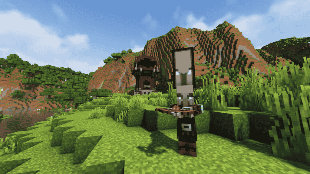 how to get the bad omen effect in minecraft