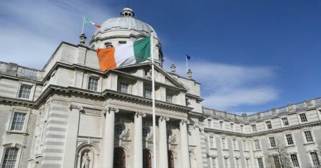 The Irish National Flag Flies Outside the Government Buildings in Dublin