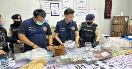 A Crackdown on Illegal Gambling in Thailand Thai Police Officers Inventory Goods Seized During a Raid of an Illegal Gambling Hall